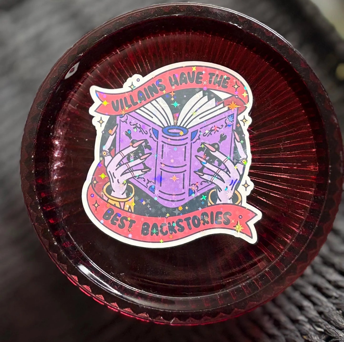 Villains have the best backstories holographic sticker